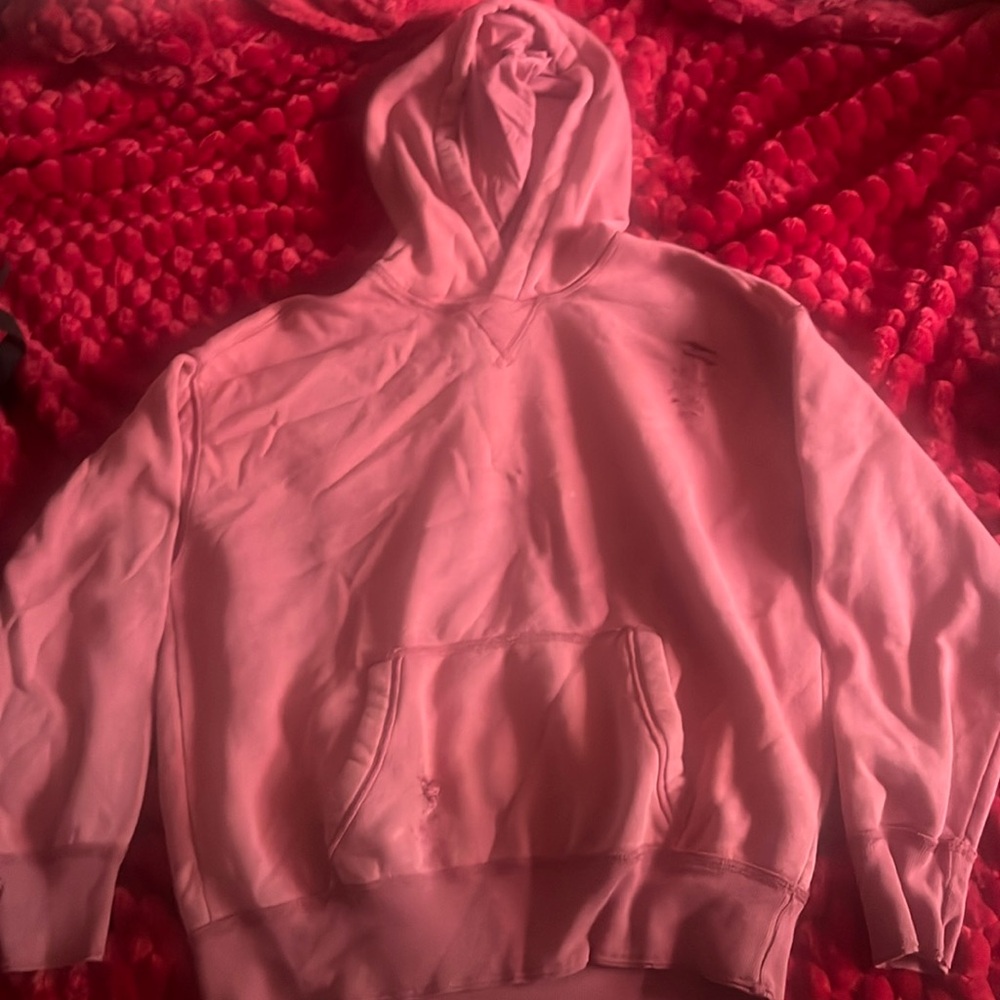 the holes are how the hoodie came, very comfy and warm good material